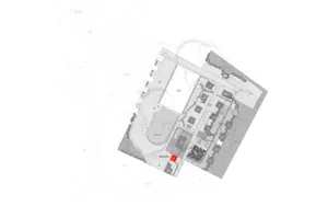 A detailed architectural drawing of a building's layout, showing rooms and corridors.