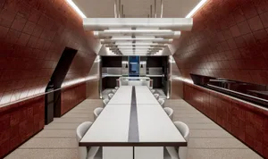 Modern office interior with wood finishes, concrete flooring, and metallic accents