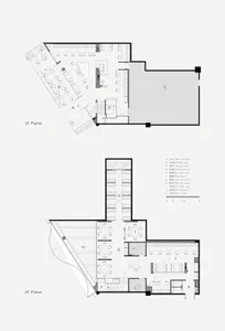 Detailed floor plan of a restaurant showing dining areas, kitchen, restrooms, and outdoor seating.