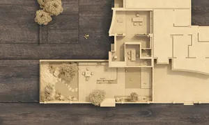 An overhead view of an apartment layout with wooden flooring.