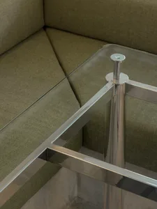 Glass and stainless steel modern interior design, featuring minimalist aesthetics and contemporary furniture.
