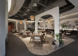 Minimalist commercial space featuring concrete tiles and industrial style pendant lights.