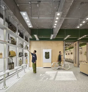 Industrial storefront with metal and glass elements.