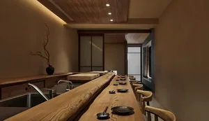 A modern restaurant interior with wooden elements and minimalist design.