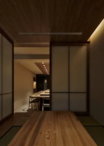Modern Japanese restaurant with wooden tables and sliding doors.