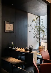 Interior design featuring modern industrial elements in a tea room setting.