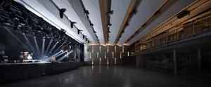 3D rendering of a modern concert hall interior with illuminated ceiling lights