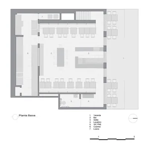 Floor plan of a coffee shop showing seating arrangements, bar area, and kitchen.