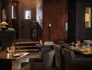 Industrial design restaurant with metal, stone, and wood accents.