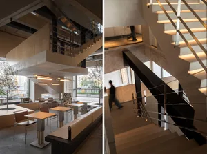 Interior of a modern industrial restaurant featuring concrete, glass, and steel materials.