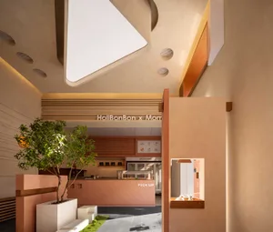 Cafe interior with terrazzo flooring, wooden accents, and a large window