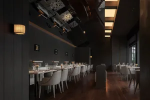 The image depicts a modern restaurant interior featuring dark wooden elements, white furniture, and a minimalist design.
