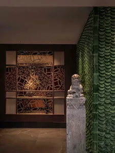 A modern lobby featuring intricate metal patterns.