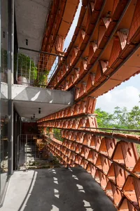 Terra cotta balcony units with modern interior design.