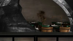 Industrial restaurant interior with metallic decor and seating