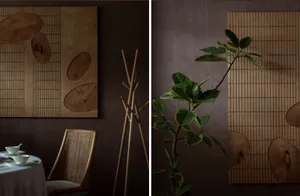 Modern restaurant interior with wooden elements and green foliage.