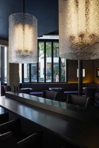 Lobby with modern industrial lighting and seating