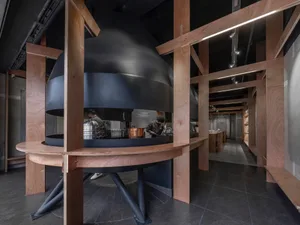 Industrial kitchen with steel and wood elements