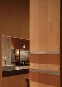 Contemporary office setting featuring exposed wooden paneling.