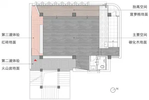 A detailed 2D architectural drawing of an industrial-style space, featuring various flooring materials and spatial compositio