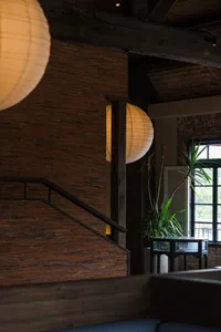 Modern interior space featuring bamboo and wooden decor.