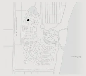 A detailed site plan of a residential development, including roadways and buildings.