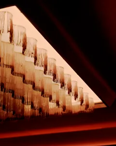 Rows of hanging fringe lighting fixtures