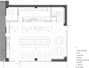 A contemporary coffee shop floor plan featuring concrete materials and minimalist design.