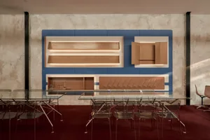 Modern minimalist restaurant interior with metal, glass, and concrete materials