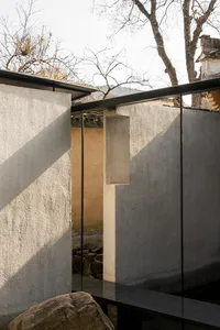 A minimalist architectural design featuring concrete materials.