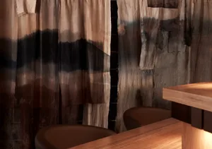 Industrial-style interior design featuring textile elements