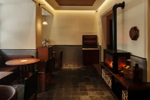 Industrial-style restaurant interior featuring wood materials.