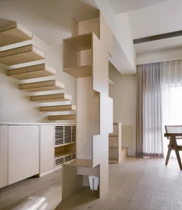 Modern interior design featuring a wooden staircase with built-in storage.