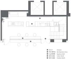 Floor plan of a restaurant showing the layout, including a bar area, booth seating, logo display, and entrance.