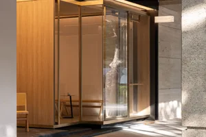 A modern cafe interior featuring wood finishes
