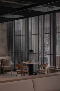 Modern industrial restaurant interior with wood and metal elements