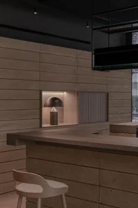 Modern interior design showcasing wooden and concrete structural elements.