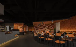 Modern restaurant interior with wooden elements and contemporary decor.