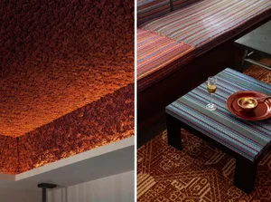 A textured textile design displayed on a table with a glass and bowl.