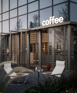 Modern coffee shop exterior with metal and glass materials and plants