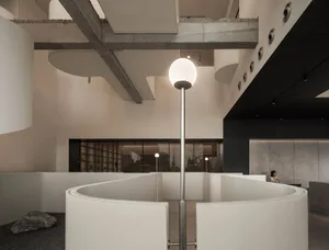Modern office space featuring concrete walls and open layout