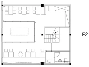 Minimalist office space with neutral colors, featuring an open plan layout, and functional zones.