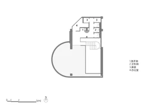 A detailed floor plan of an office space with labeled rooms, including a restroom, kitchenette, reception area, and workspace