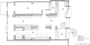 A minimalist restaurant interior with a simple layout, white color scheme, and open space.