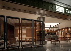 Modern retail coffee shop interior with wooden accents and metallic structural elements.