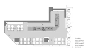 Restaurant floor plan with seating areas, kitchen, and entrances.