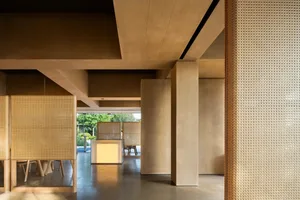 A modern office space with concrete walls and minimalist design.