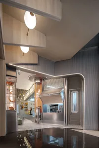 Metallic commercial space interior with modern design elements.