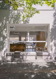 A modern coffee shop interior with sleek, minimalistic design