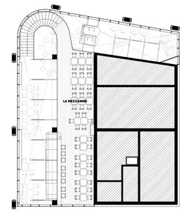 Floor plan showcasing a restaurant layout with seating arrangements and designated areas.